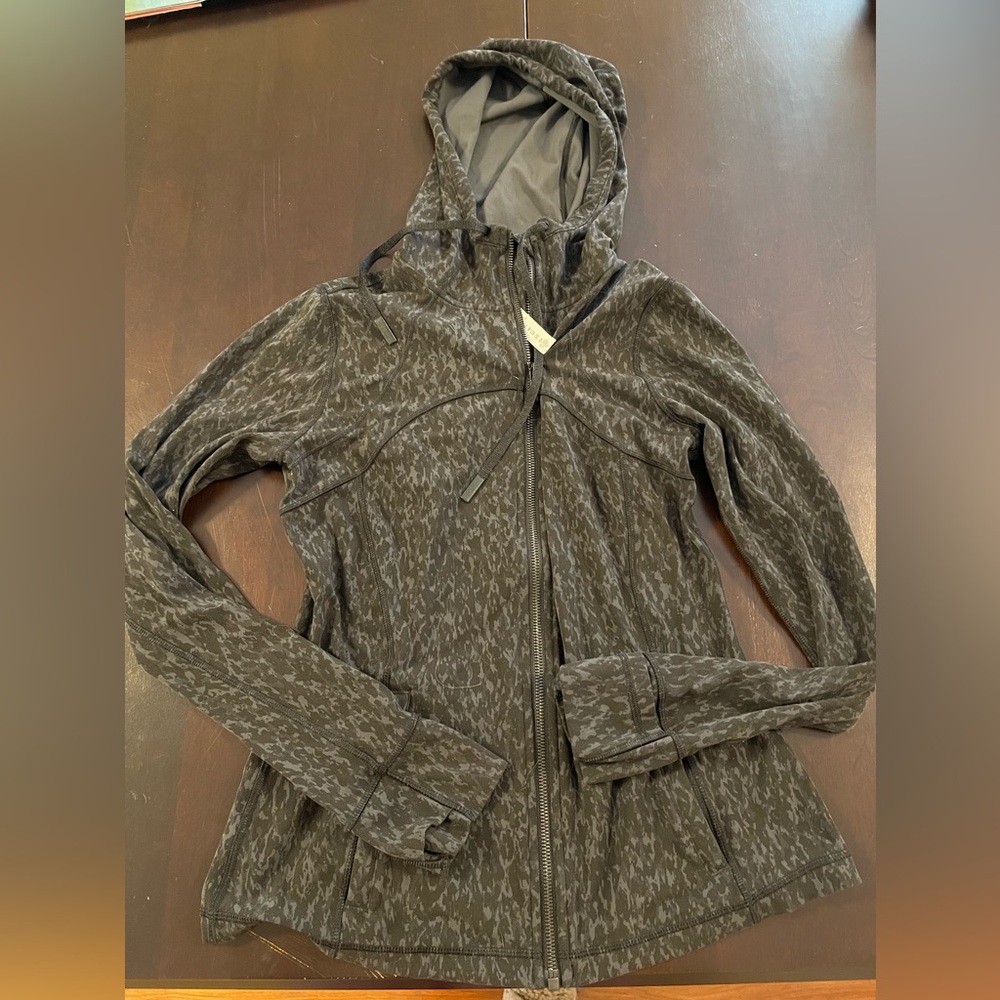 Lululemon nulu define jacket size 10 (speckled leopard print)